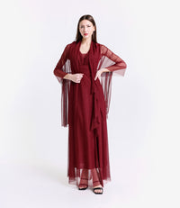 Abito vino con drappeggi, ideale per eventi esclusivi