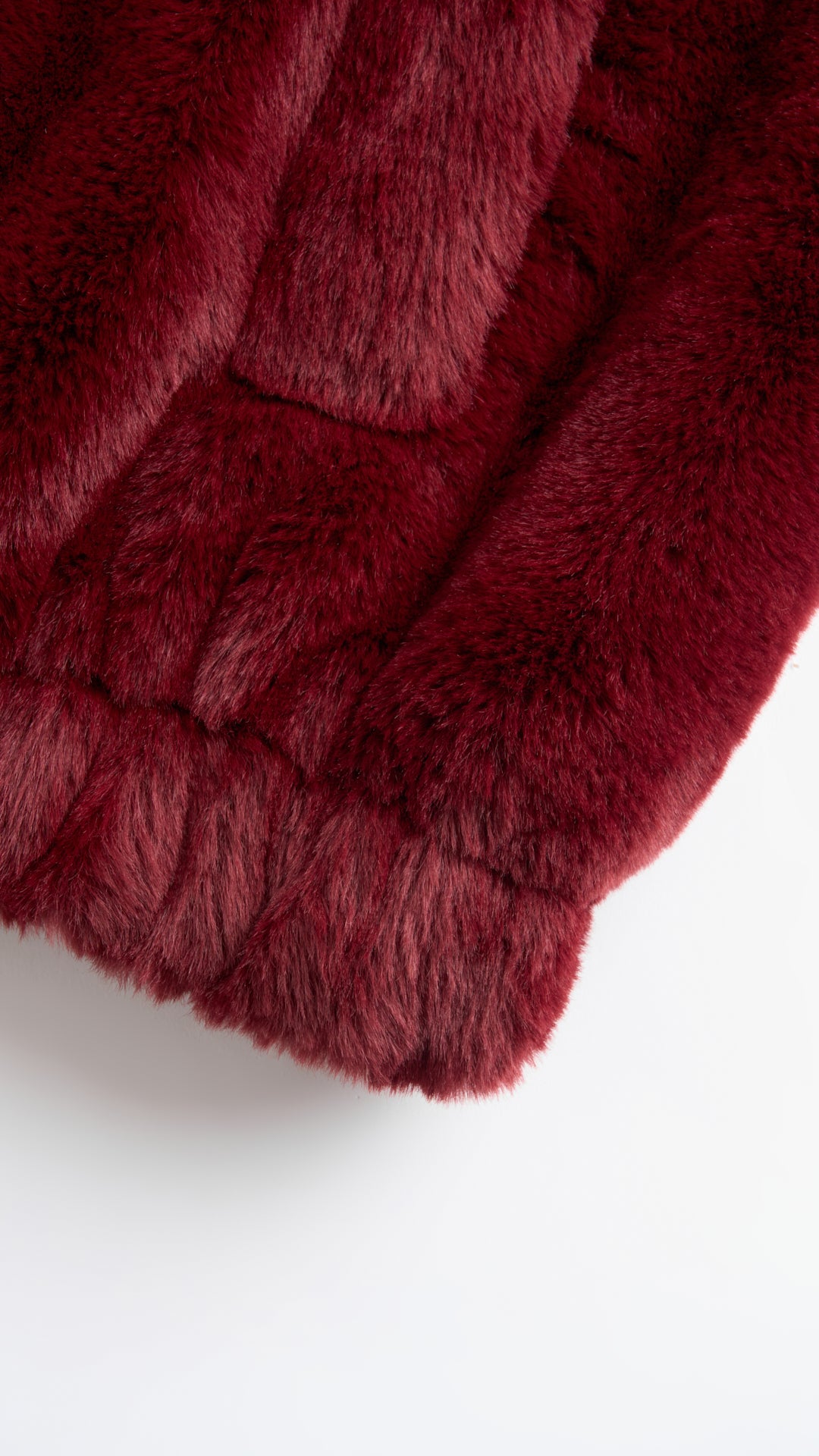 Giacca con cappuccio in peluche sintetica con zip e coulisse