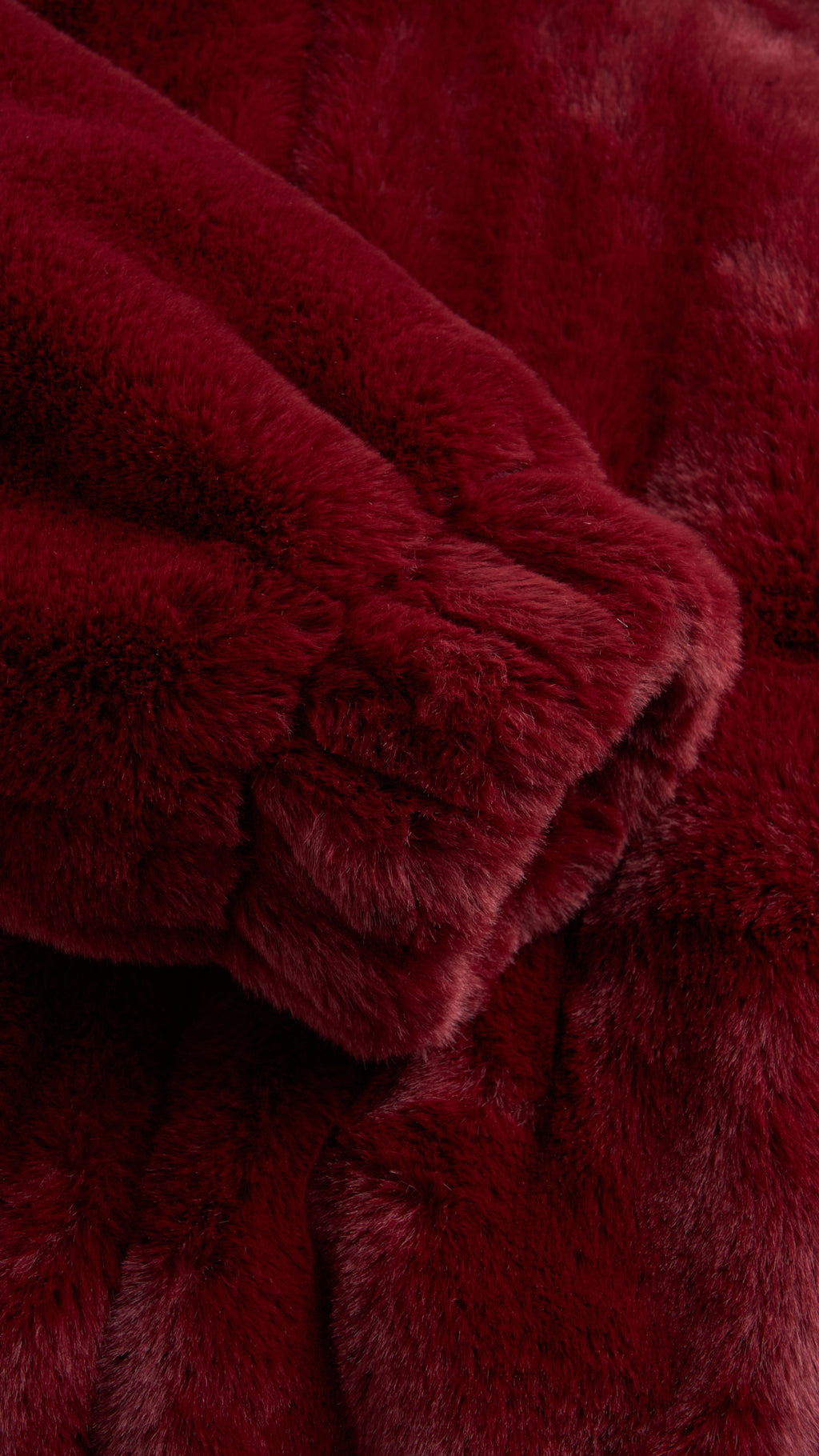 Giacca con cappuccio in peluche sintetica con zip e coulisse