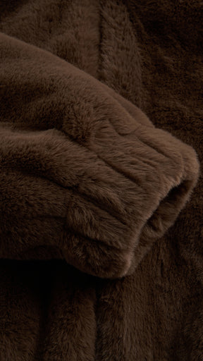 Giacca con cappuccio in peluche sintetica con zip e coulisse