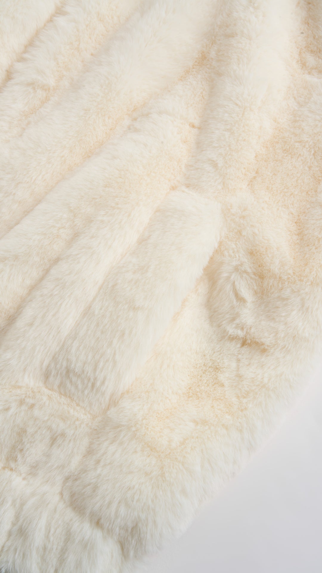 Giacca con cappuccio in peluche sintetica con zip e coulisse