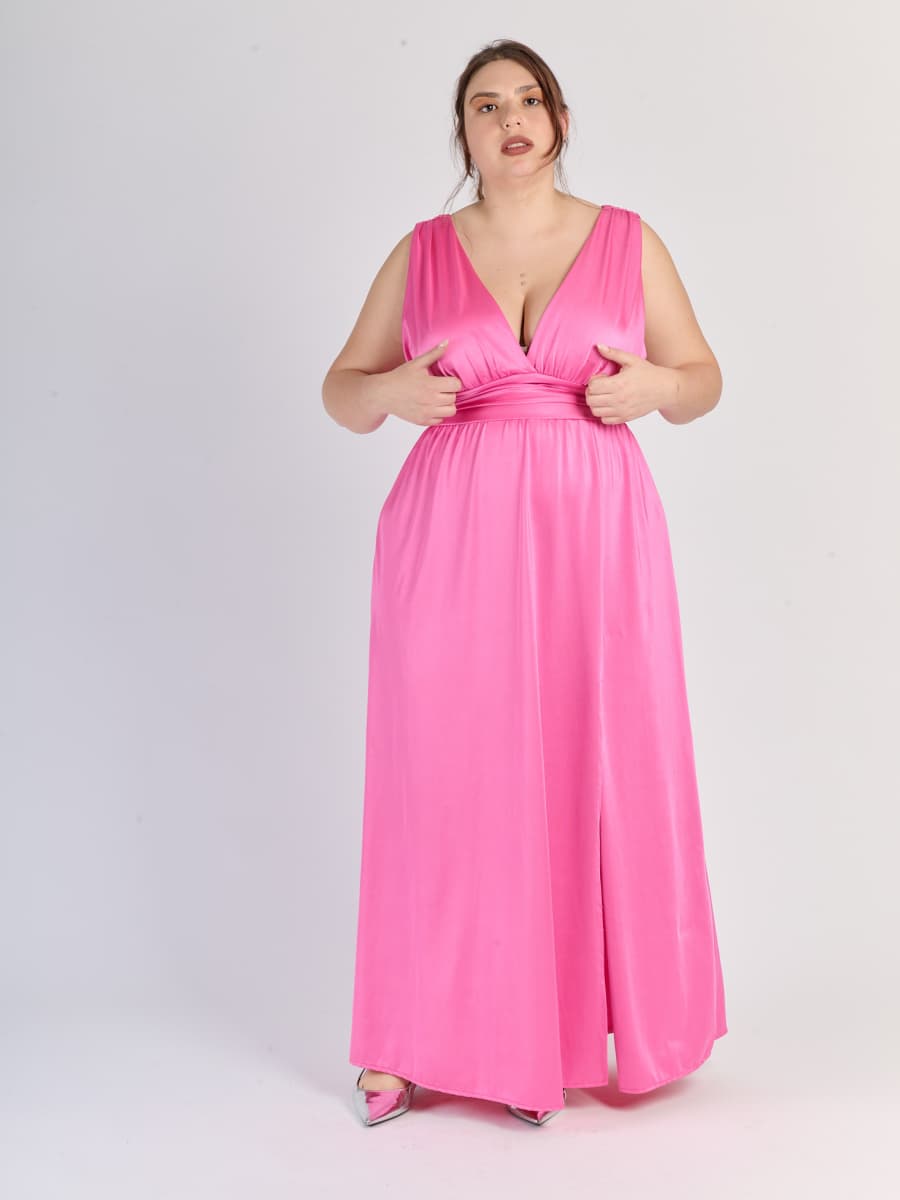 Lungo abito Fuxia senza maniche con scollo a V profondo e vita in pizzo, perfetto per uno stile audace 
