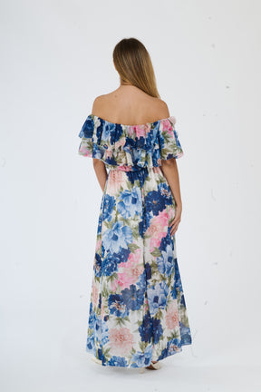 Lungo abito navy a fiori con silhouette avvolgente e dettagli di ruches, perfetto per occasioni formali e eleganti.