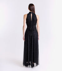 Lungo vestito nero-argento con puzzo e legature laterali metalliche, design futuristico per feste.