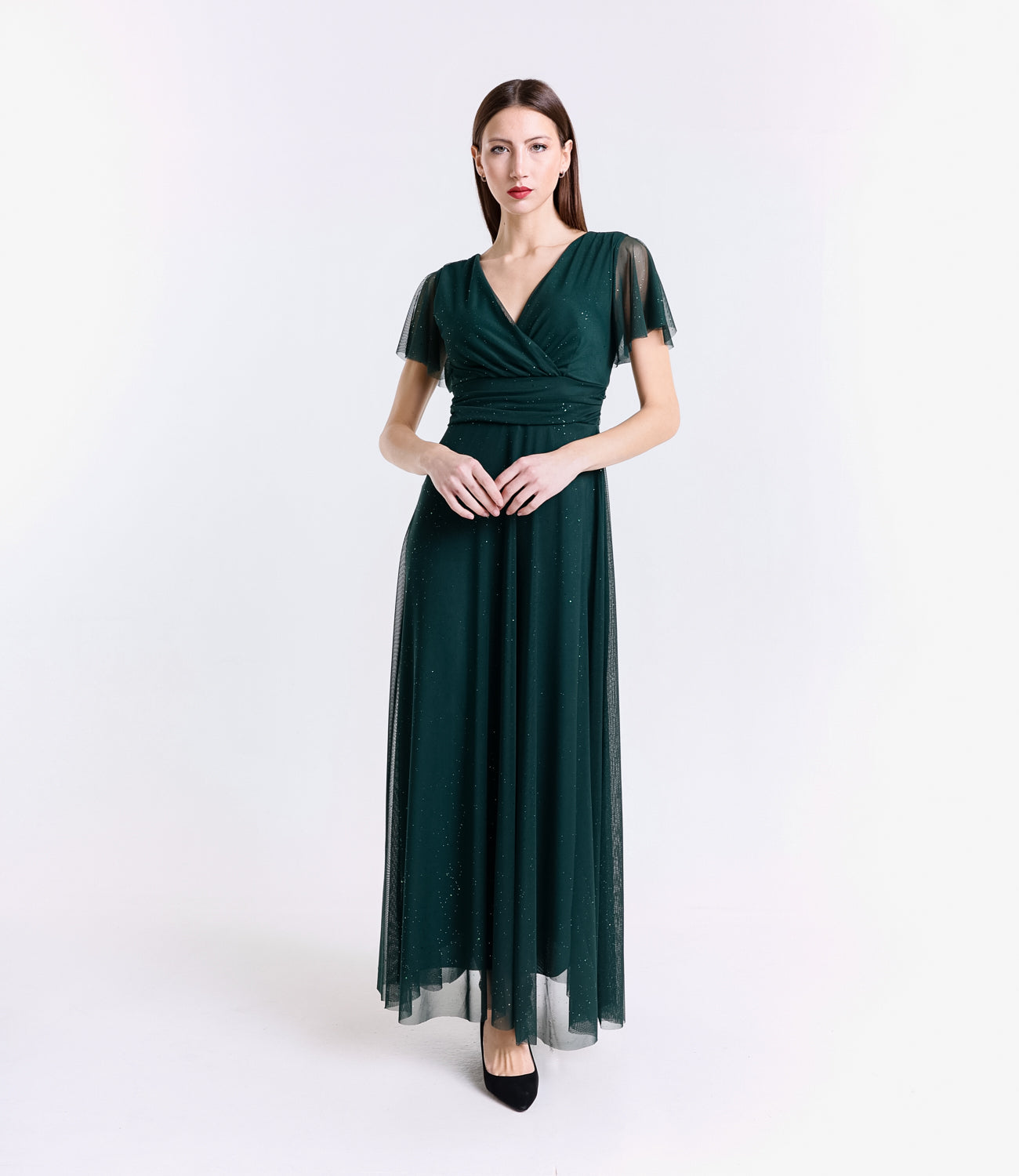 Lungo vestito verde.S in tulle, design a V elegante