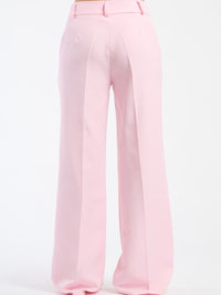 Pantaloni rosa baby fluidi con chiusura a bottoni, vivaci e confortevoli.