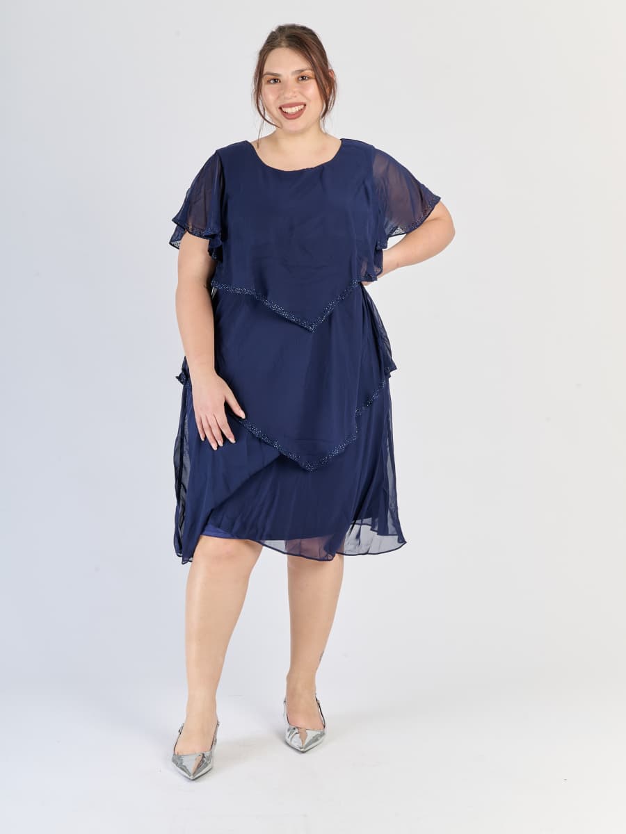 Vestito navy da sera, silhouette avvolgente con strati e maniche svettanti