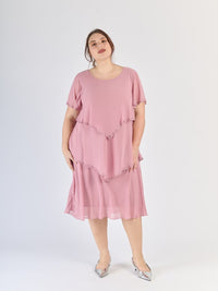 Vestito rosa antico con pannelli sovrapposti, maniche corte traslucide e stile retrò