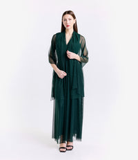 Abito da cerimonia verde scuro conspalline svitate e tessuto lussuoso