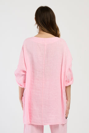 Ensemble rosa, top a maniche 3/4 e pantaloni larghi, dolcezza per le giornate estive.