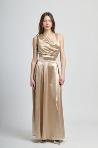 Abito da cerimonia beige con spalla unica e falda fluida