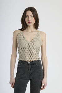 Top boho beige, perfetto per abbinamenti casual e festività estive.