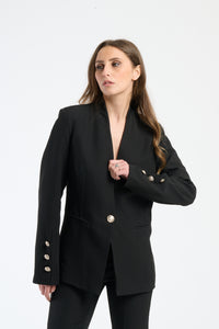 Camicia bluette con maniche frisate e collo a V.