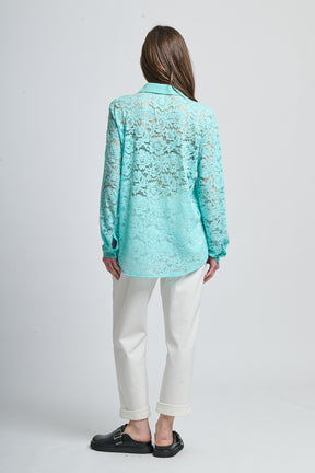 Camicia oversize verde acqua stampa, stile vibrante con bottoni frontali e maniche lunghe.
