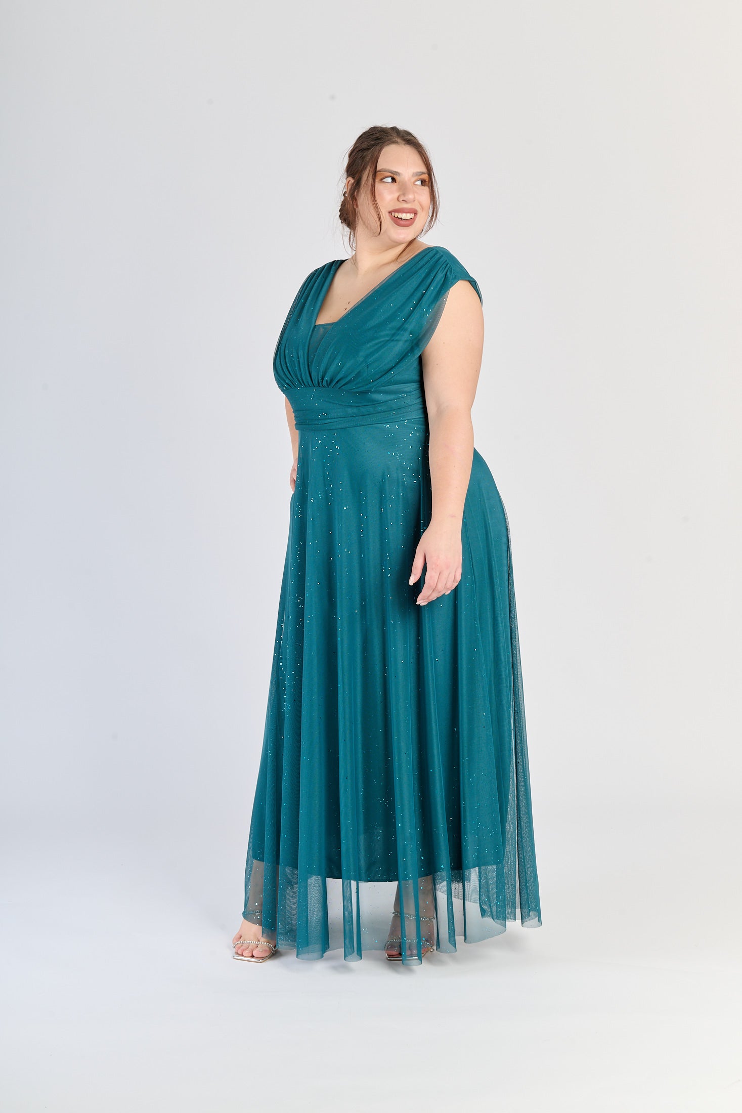 Abito ottanio elegante, maniche senza spalline e gonna midi, per serate particolari.