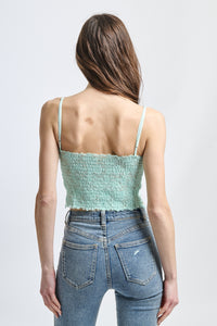 Top fresco verde menta, ideale per look estivi e occasioni naturali.