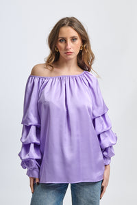 Blusa lilla a spalla nuda, maniche ruffle, taglio oversize, stile affascinante