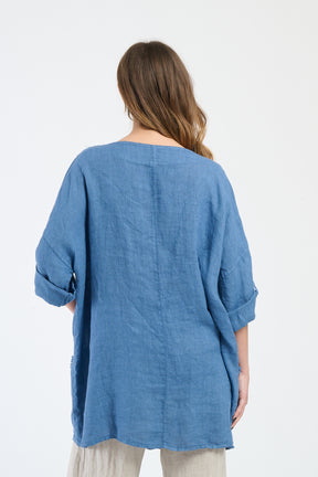 top ampio con tasche e bottoni, comfort rustico per il weekend.