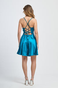 Vestito ottanio corto, colletto a cuore, stile futuristico