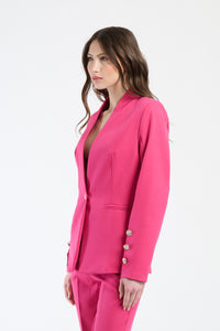 Camicia fuxia con maniche raccordate e tasca sul petto.