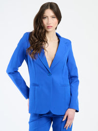 Completo bluette da donna, blazer e pantaloni, colore intenso per uno stile raffinato