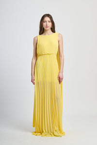 Abito elegante giallo con apertura dorsale e falda ampia soffice