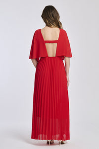 Vestito rosso con falde al fondo, mantenendo lo stile dinamico e seducente, perfetto per occasioni esclusive.