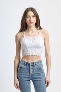 Canotta elegante bianco, tessuto traslucido con motivi floreali