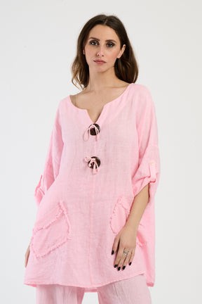 Completo rosa dolce, top ampio con tasche e bottoni, romanticismo per il tempo libero.
