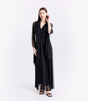 Abito da cerimonia nero conspalline svitate e stile impeccabile