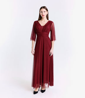 Abito da festa vino intenso con fascia in vita, colore rico e elegante