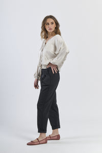 Cardigan beige minimalista concollo a V