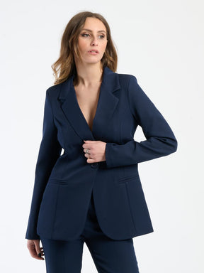Combinazione navy: blazer e pantaloni, un must - have per il guardaroba business.