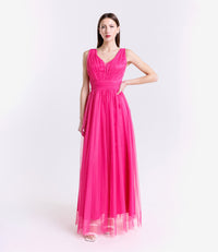 Abito da festa fuxia in tulle, vivace e dal grande impatto visivo