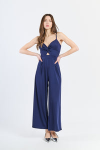 Tuta intera navy con bretelle sottili e taglio cut-out elegante