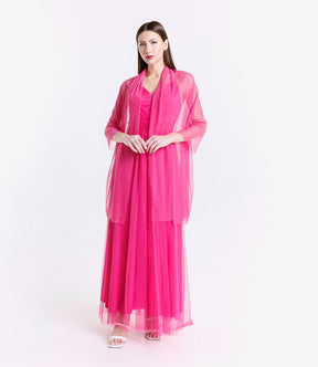 Abito formale fuxia con taglio drammatico, ideale per serate notturne