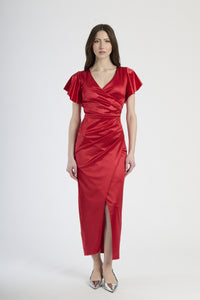 Outfit con abito rosso lungo, perfetto per un look memorabile e dal sapore Hollywood.