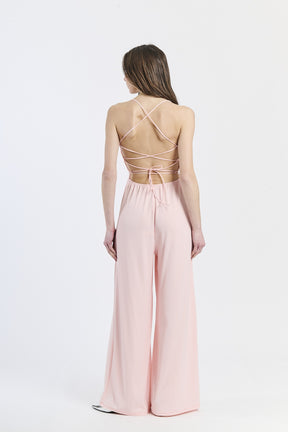 Combinazione rosa, top a fascia e pantaloni larghi, affascinante, per eventi estivi