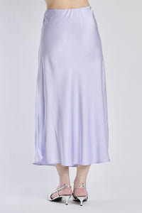 Gonna lilla fluida di raso, modello dritto e romantico