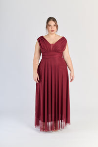 Abito vino da cerimonia, colletto a V e gonna fluviale, passione ed eleganza.