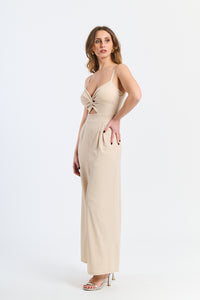 Tuta monopezzo beige, colletto a V e effetto avvolgente