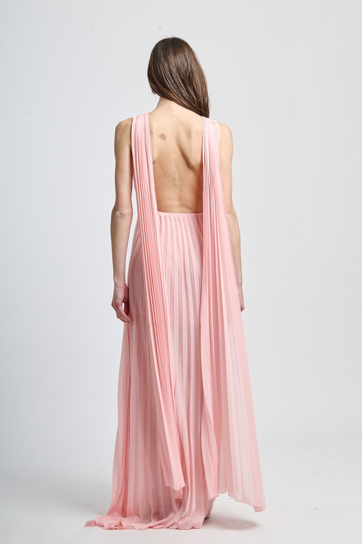 Abito elegante rosa con apertura dorsale