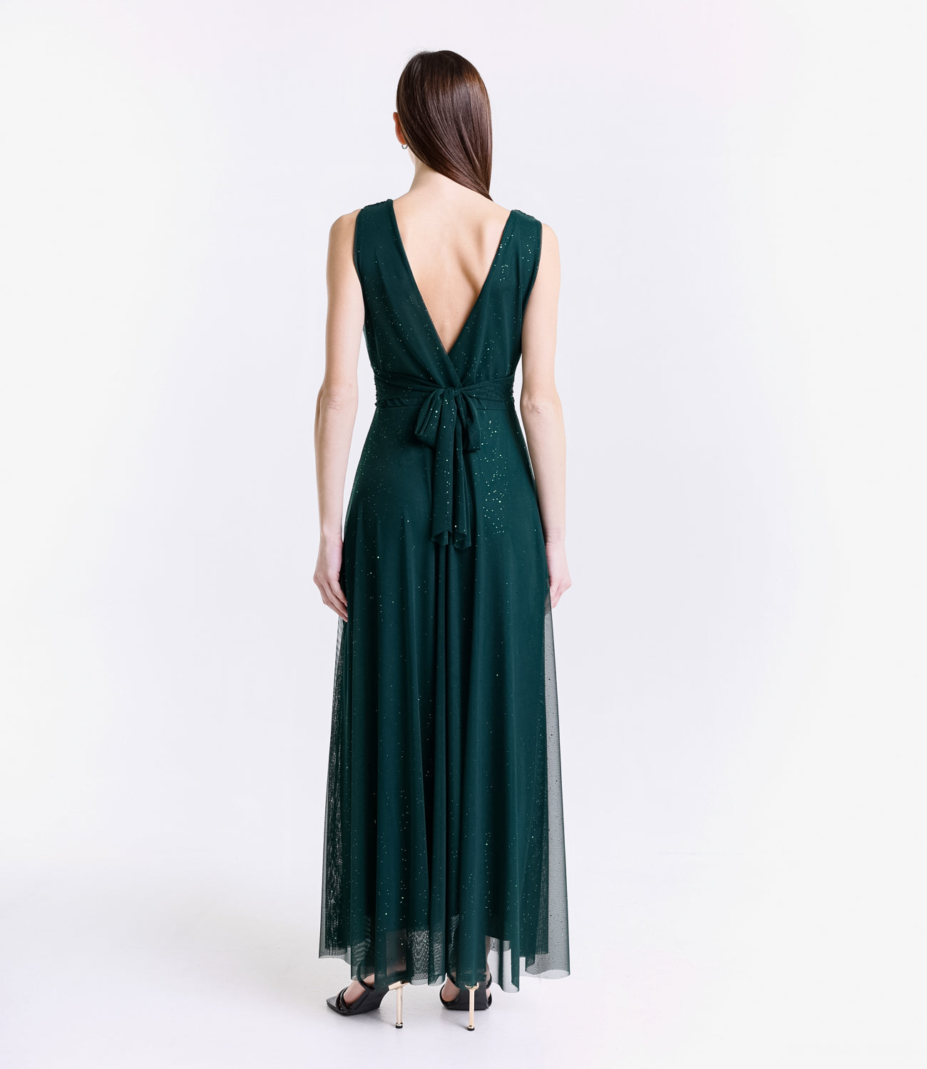 Robe verde scuro formale confodera fluida e silhouette stilosa