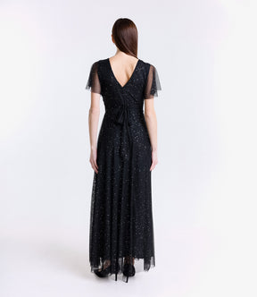 Abito nero-argento con maniche corte, effetto luminoso e glamour