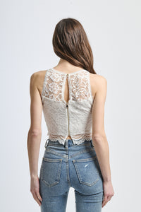 Canotta elegante in pizzo bianco, taglio cropped con dettagli floreali