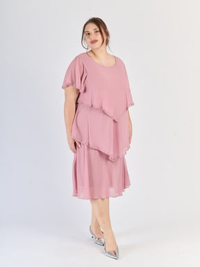Vestito rosa antico da sera, silhouette avvolgente con strati e maniche svettanti