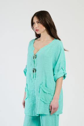 Combinazione Tiffany da giorno, top leggero con tasche decorativa, ideale per un look accattivante.